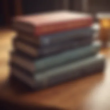 A stack of classic investment books on a wooden desk