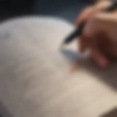 A close-up of an open book with notes and a pen